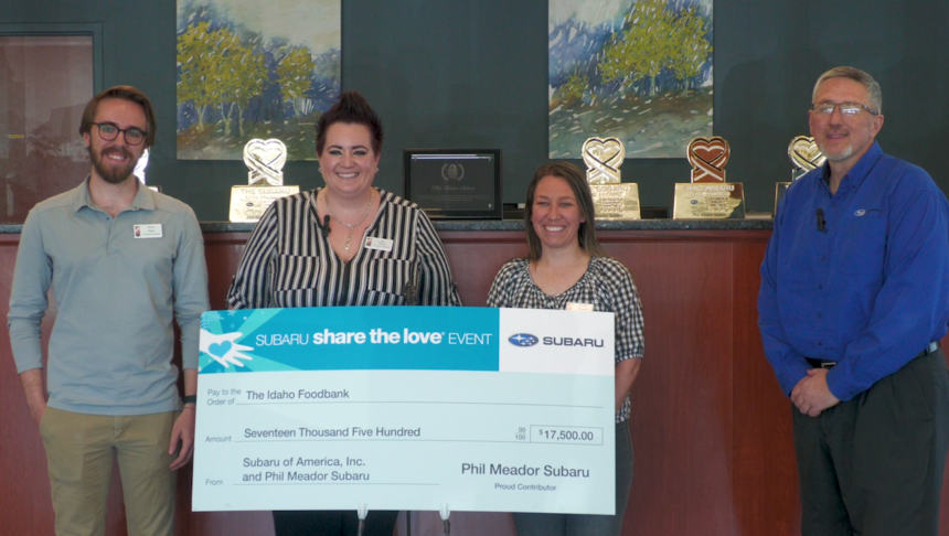 Idaho Foodbank and Phil Meador Subaru representatives with the $17,500 check
